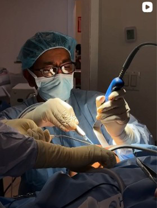Dr. Sabry performing surgery